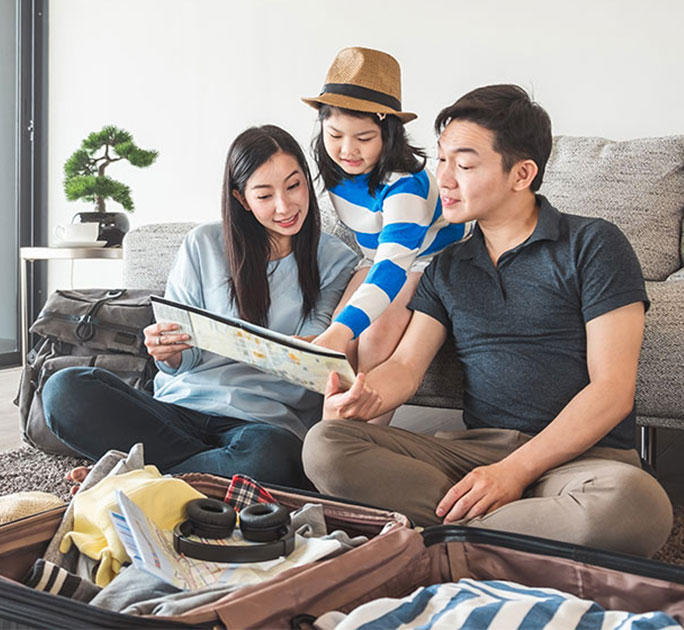 Family packing for their vacation trip